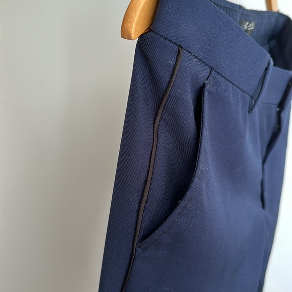 Navy dress pants with thin black stripe down outside of leg. - Picture 3 of 5